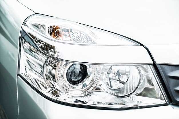 Где находится корректор фар в Toyota Camry 40